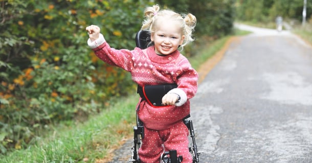 Ella smiling in her NF-Walker