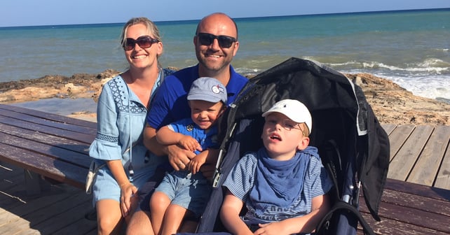 Family with disabled child on vacation. Having a child with disabilities: Living, challenges and finding time for yourself