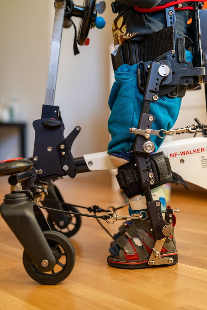 boy in his NF walker