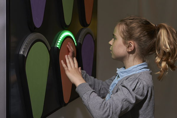 TREAX Pads on wall with girl close-up 1-1