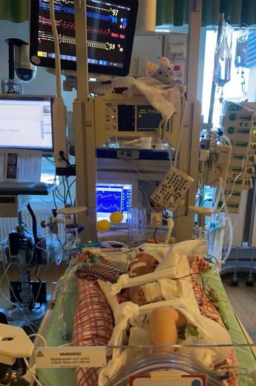 baby in hospital bed