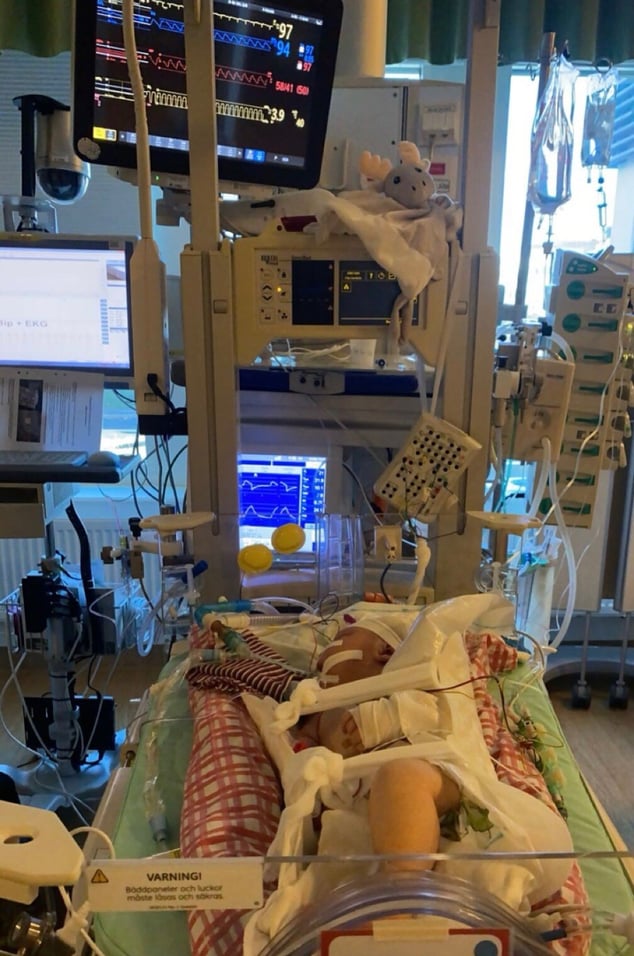 baby in hospital bed